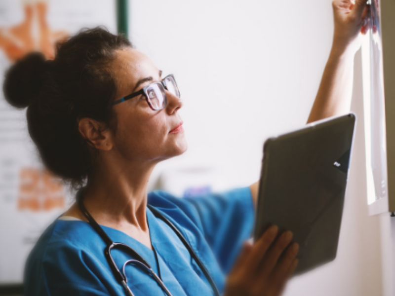 A Lady Doctor with her notes