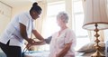 A Lady Doctor treating an Old Women